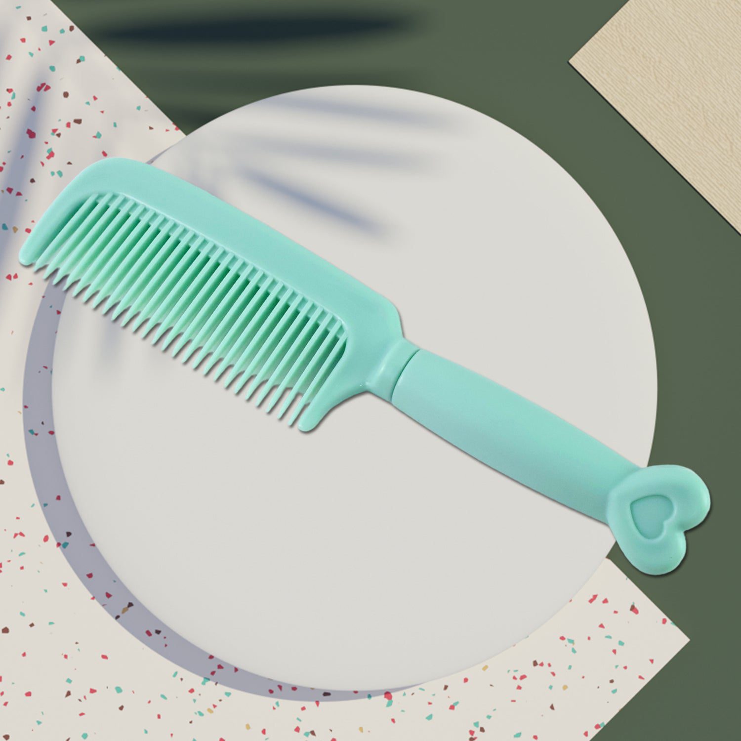 01_de658e50-d1a6-4977-8813-735aaf5e0529.jpg Plastic Hair Comb with Heart-Shaped Handle (1 Pc) - Front View by Nari Haat, Indian ethnic wear, women clothing, desi...