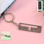 Stylish Devotional Text Metal Keychain (1 Pc) - Front View by Nari Haat, Indian ethnic wear, women clothing, designer...