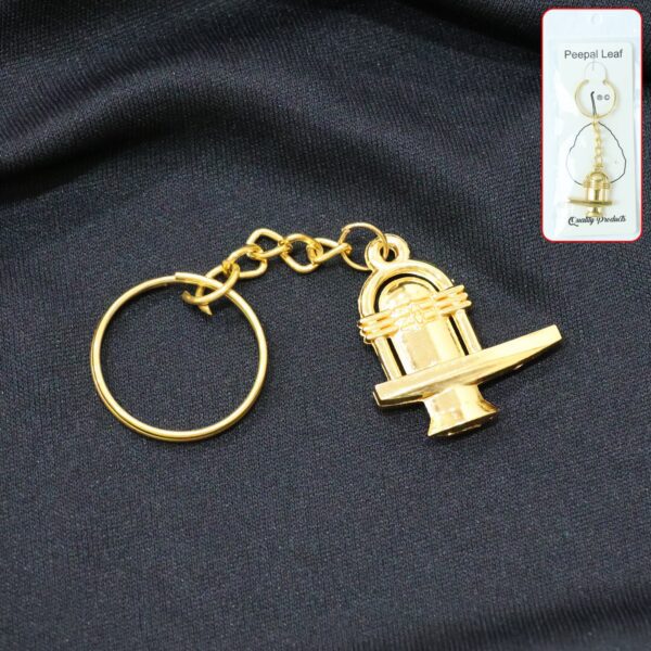 Shivling Golden Metal Keychain (1 Pc) - Front View by Nari Haat, Indian ethnic wear, women clothing, designer suit