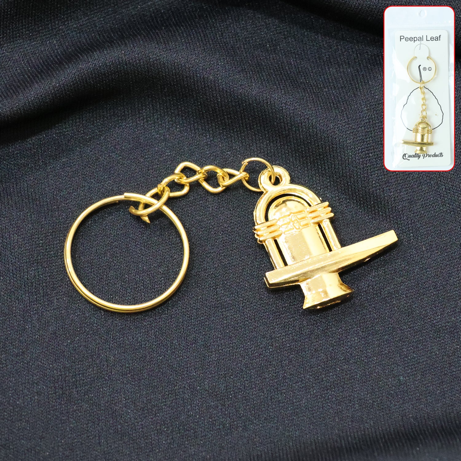 01_keychain_0719bd80-50b5-4e10-bd4d-ce7b8ffa9943.jpg Shivling Golden Metal Keychain (1 Pc) - Front View by Nari Haat, Indian ethnic wear, women clothing, designer suit