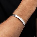 Minimalist Polished Open-Ended Silver-Tone Stainless Steel Kada (1 Pc) - Neckline Detail by Nari Haat, Indian ethnic ...