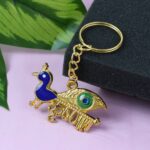 Krishna Peacock Design Golden Keychain (1 Pc) - Front View by Nari Haat, Indian ethnic wear, women clothing, designer...