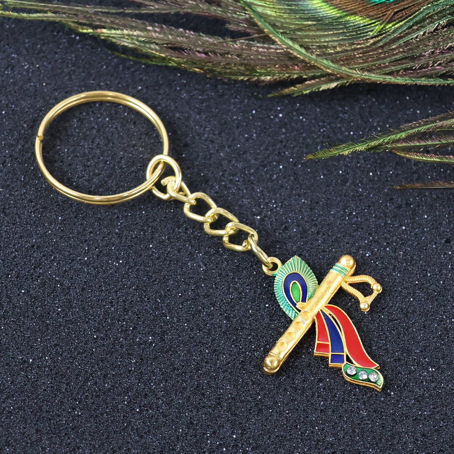 02_8e28fca3-ac70-4e33-a882-5d4ed5a5d2d3.jpg Krishna Flute with Peacock Feather Design Keychain (1 Pc) - Front View by Nari Haat, Indian ethnic wear, women clothi...