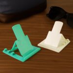 Adjustable Foldable Plastic Mobile Phone Stand Holder (2 Pc) - Back View by Nari Haat, Indian ethnic wear, women clot...
