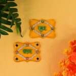 Shubh Labh Decorative Wall Hangings (2 Pc) - Neckline Detail by Nari Haat, Indian ethnic wear, women clothing, design...