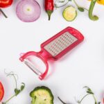 2-in-1 Multifunctional Kitchen Peeler with Grater (1 Pc) - Front View by Nari Haat, Indian ethnic wear, women clothin...
