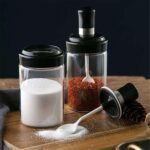 Clear Glass Spice Jar with Integrated Spoon & Airtight Lid (250ml Approx) - Neckline Detail by Nari Haat, Indian ethn...
