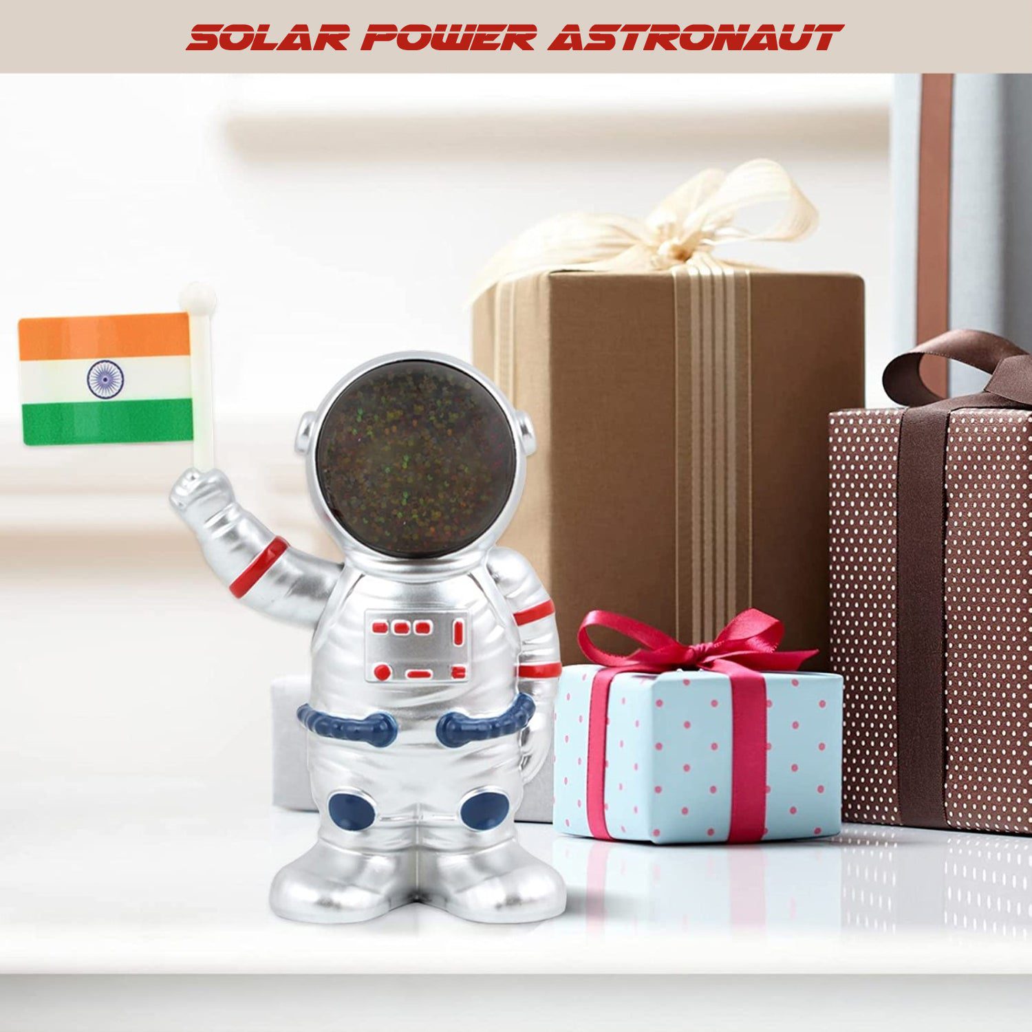 02_bb7c9488-d880-49ff-85c3-35f5fb39d1fa.jpg Solar Power Astronaut Ornament Moving Hand with Indian Flag (1 Pc) - Front View by Nari Haat, Indian ethnic wear, wom...