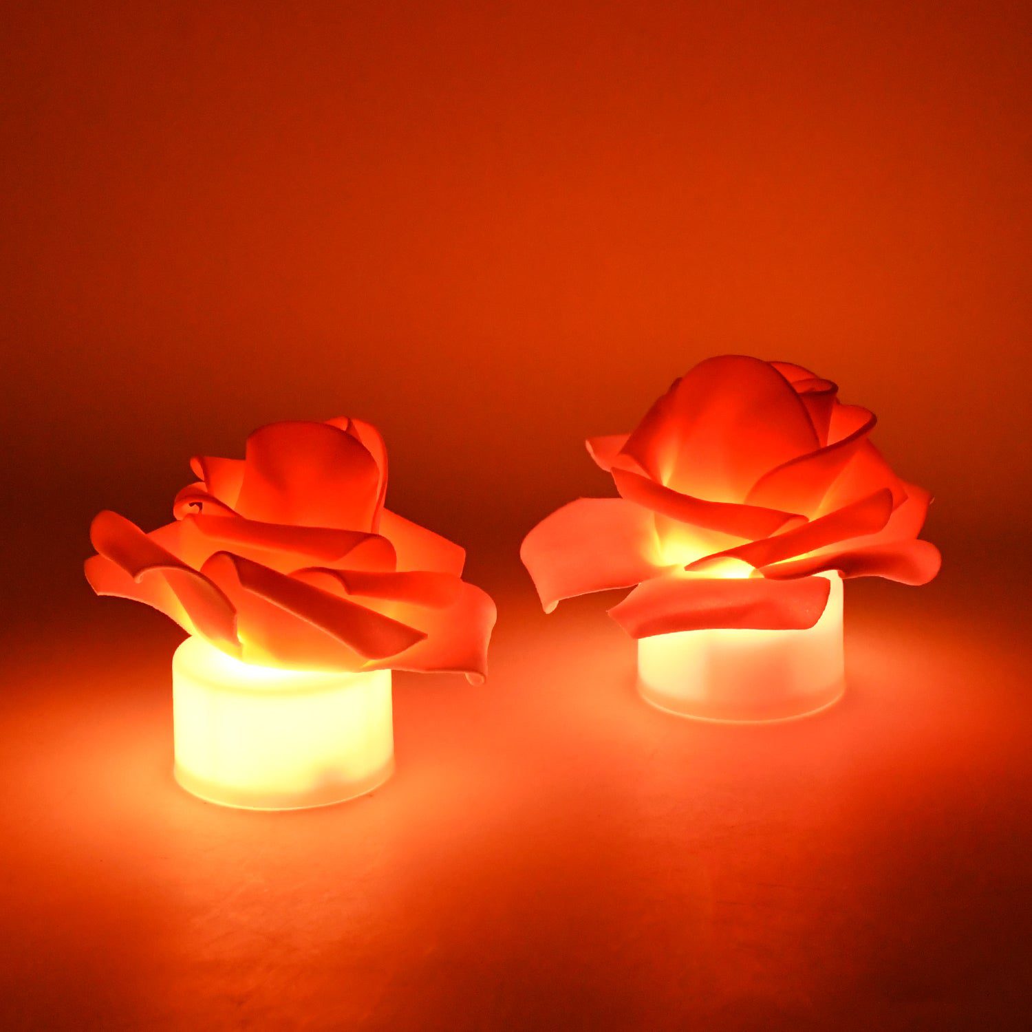02_candle_f4eb4fc0-89eb-498c-b68e-30f2cc172f51.jpg Rose Flower Shaped LED Flickering Tealight Candles (2 Pc) - Front View by Nari Haat, Indian ethnic wear, women clothi...