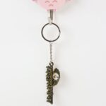 “Jai Dwarkadhish” Text Metal Keychain (1 Pc) - Back View by Nari Haat, Indian ethnic wear, women clothing, design...