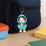Cartoon Character Design Cute Action Figure Keychain (Mix  Design & 1 Pc) - Neckline Detail by Nari Haat, Indian ethn...