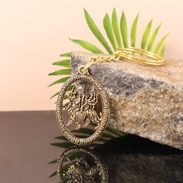 Premium Golden Metal Durga Maa Keychain (1 Pc) - Front View by Nari Haat, Indian ethnic wear, women clothing, designe...