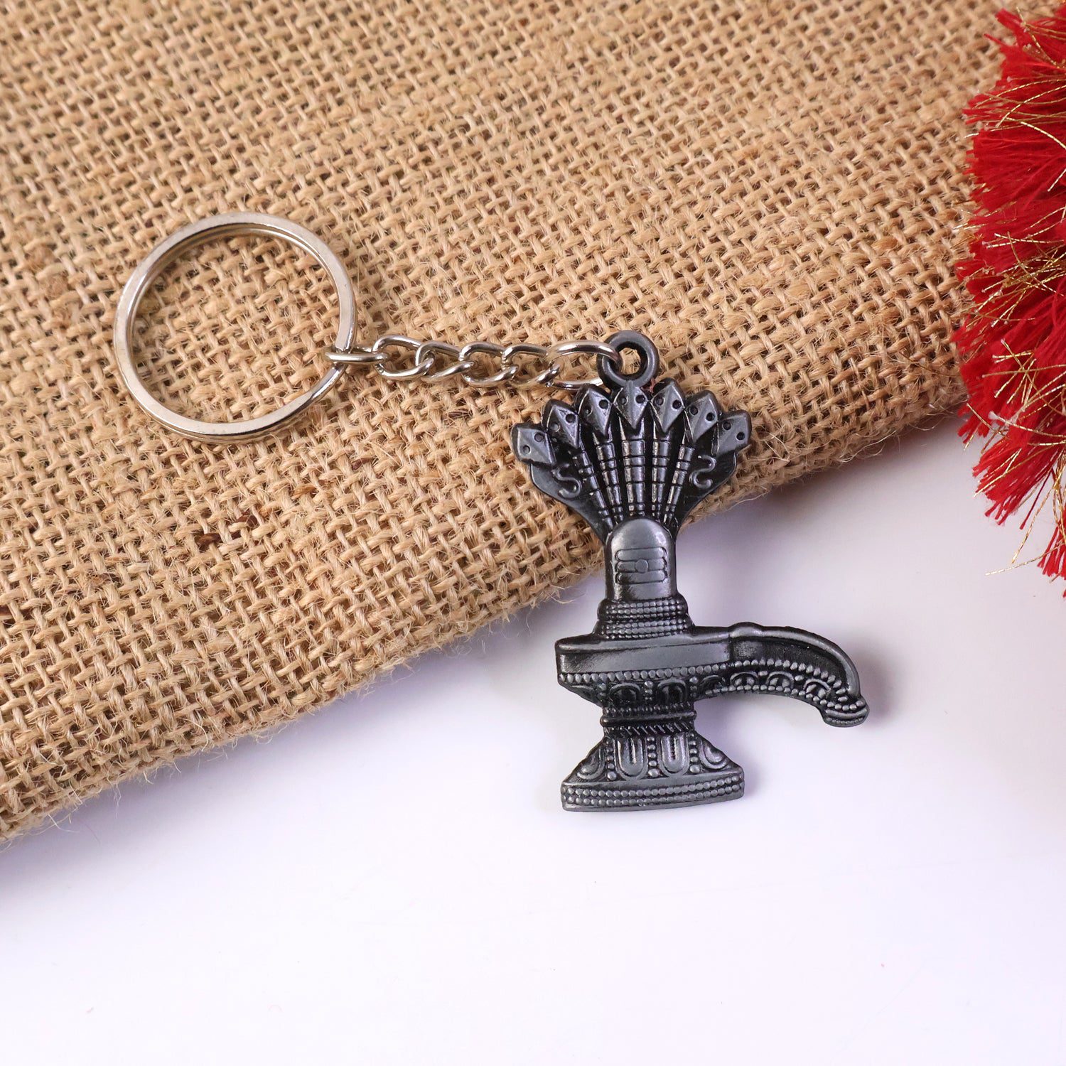 02_keychain_7be94583-8222-4c33-942a-139afb44107e.jpg Premium Metal Shiva Lingam with Naag Religious Keychain (1 Pc) - Front View by Nari Haat, Indian ethnic wear, women c...