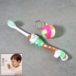 Kids Toothbrush and Ball Keychain Toy Set - Front View by Nari Haat, Indian ethnic wear, women clothing, designer suit