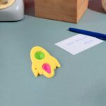 Rocket Shaped Dimple Keychain Toy (1 Pc) - Closeup Embroidery by Nari Haat, Indian ethnic wear, women clothing, desig...