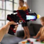 TTG LED Flashing Sound Laser Toy Gun – Battery Operated Space Gun with Lights & Music - Front View by Nari Haat, In...