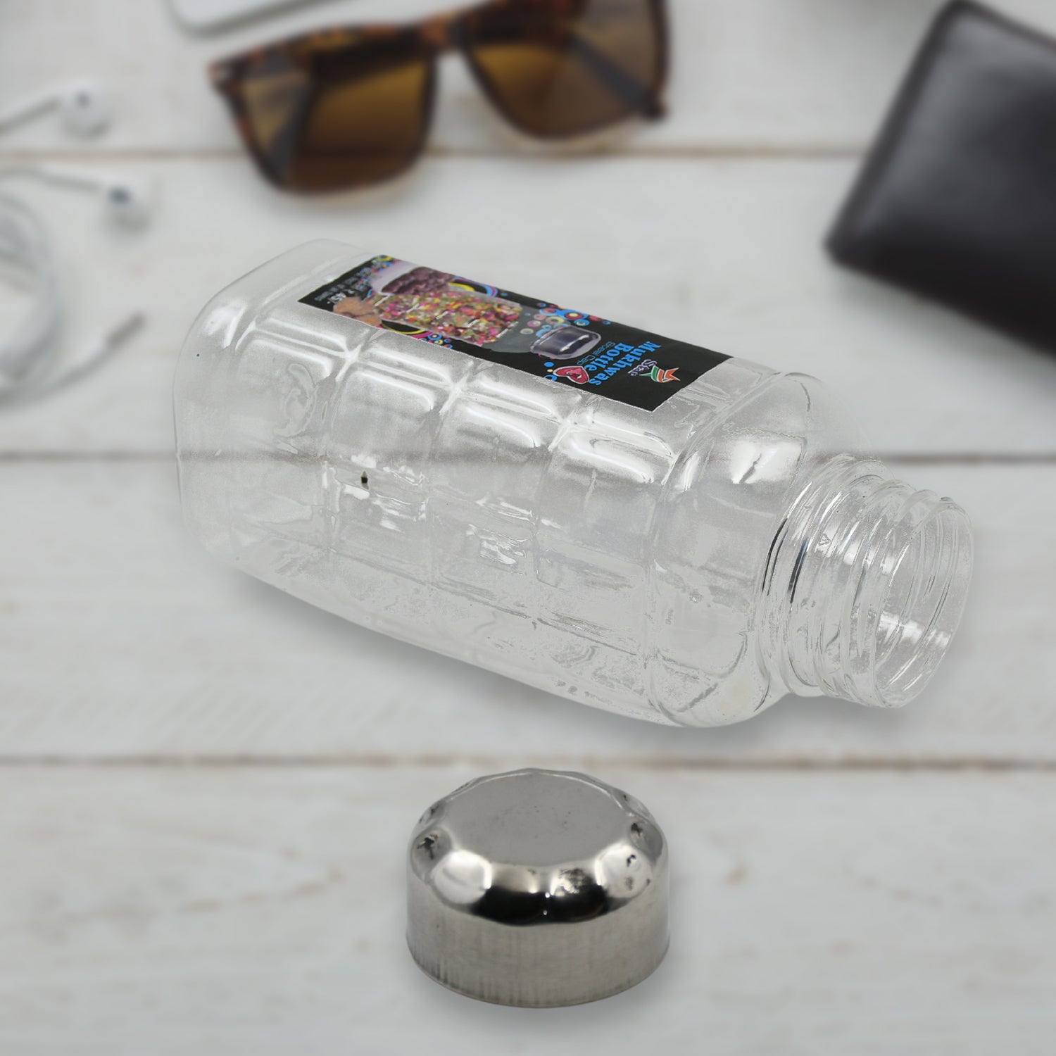 03_6ad4ff99-6b71-44a9-90ad-e4e0f695a966.jpg Transparent Plastic Mukhwas Storage Bottle with Steel Cap