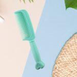 Plastic Hair Comb with Heart-Shaped Handle (1 Pc) - Back View by Nari Haat, Indian ethnic wear, women clothing, desig...