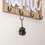 Ganesh Face Antique Black Metal Keychain (1 Pc) - Back View by Nari Haat, Indian ethnic wear, women clothing, designe...