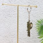 “Jai Dwarkadhish” Text Metal Keychain (1 Pc) - Closeup Embroidery by Nari Haat, Indian ethnic wear, women clothin...