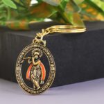 Metal Traditional Decorative Lord Krishna Keychain (1 Pc) - Neckline Detail by Nari Haat, Indian ethnic wear, women c...