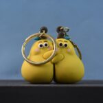 2-in-1 Cute Cartoon Couple Keychain - Full Detail by Nari Haat, Indian ethnic wear, women clothing, designer suit