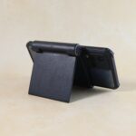 Plastic Foldable Desktop Mobile Stand (1 Pc / Black) - Fabric Detail by Nari Haat, Indian ethnic wear, women clothing...