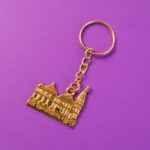 Premium Golden Metal Ram Mandir Keychain (1 Pc) - Back View by Nari Haat, Indian ethnic wear, women clothing, designe...