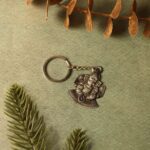 Lord Ganesha Sitting Design Silver Keychain (1 Pc) - Back View by Nari Haat, Indian ethnic wear, women clothing, desi...