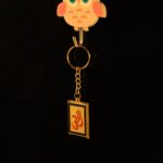 Om Trishul Symbol Golden Keychain (1 Pc) - Back View by Nari Haat, Indian ethnic wear, women clothing, designer suit