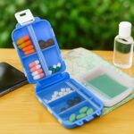Portable Blue Dual-Sided Pill Organizer Box (1 Pc) - Closeup Embroidery by Nari Haat, Indian ethnic wear, women cloth...