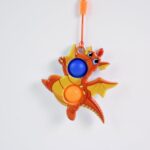 2-Bubble Dragon-Shaped Push Pop Fidget Toy with Strap (1 Pc) - Neckline Detail by Nari Haat, Indian ethnic wear, wome...