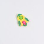 Rocket Shaped Dimple Keychain Toy (1 Pc) - Sleeve Design by Nari Haat, Indian ethnic wear, women clothing, designer suit