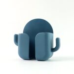 Wall Mounted Adhesive Phone Holder & Remote Organizer(1Pc) - Sleeve Design by Nari Haat, Indian ethnic wear, women cl...