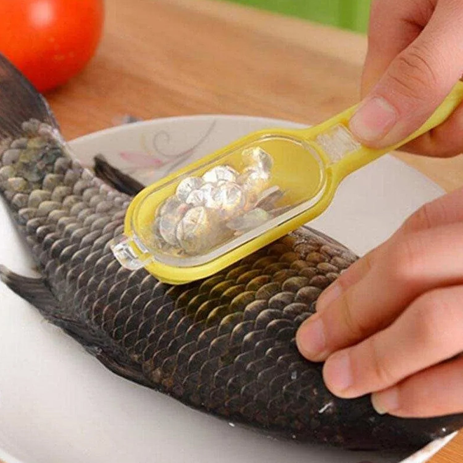 04_aa5c9f91-dace-46c6-9824-81d0f0614804.jpg Plastic fish cleaning tool with scraper and grater
