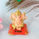 Decorative Medium Lord Ganesh Idol Decorative Statue with Solar-Powered Base (1 Pc) - Closeup Embroidery by Nari Haat...