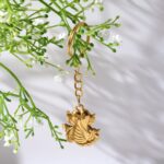 Golden Ganesh Leaf Design Keychain (1 Pc) - Closeup Embroidery by Nari Haat, Indian ethnic wear, women clothing, desi...