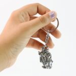 Radha Krishna Metal Keychain (1 Pc) - Front View by Nari Haat, Indian ethnic wear, women clothing, designer suit