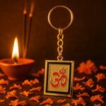 Om Trishul Symbol Golden Keychain (1 Pc) - Neckline Detail by Nari Haat, Indian ethnic wear, women clothing, designer...
