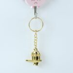 Shivling Golden Metal Keychain (1 Pc) - Neckline Detail by Nari Haat, Indian ethnic wear, women clothing, designer suit
