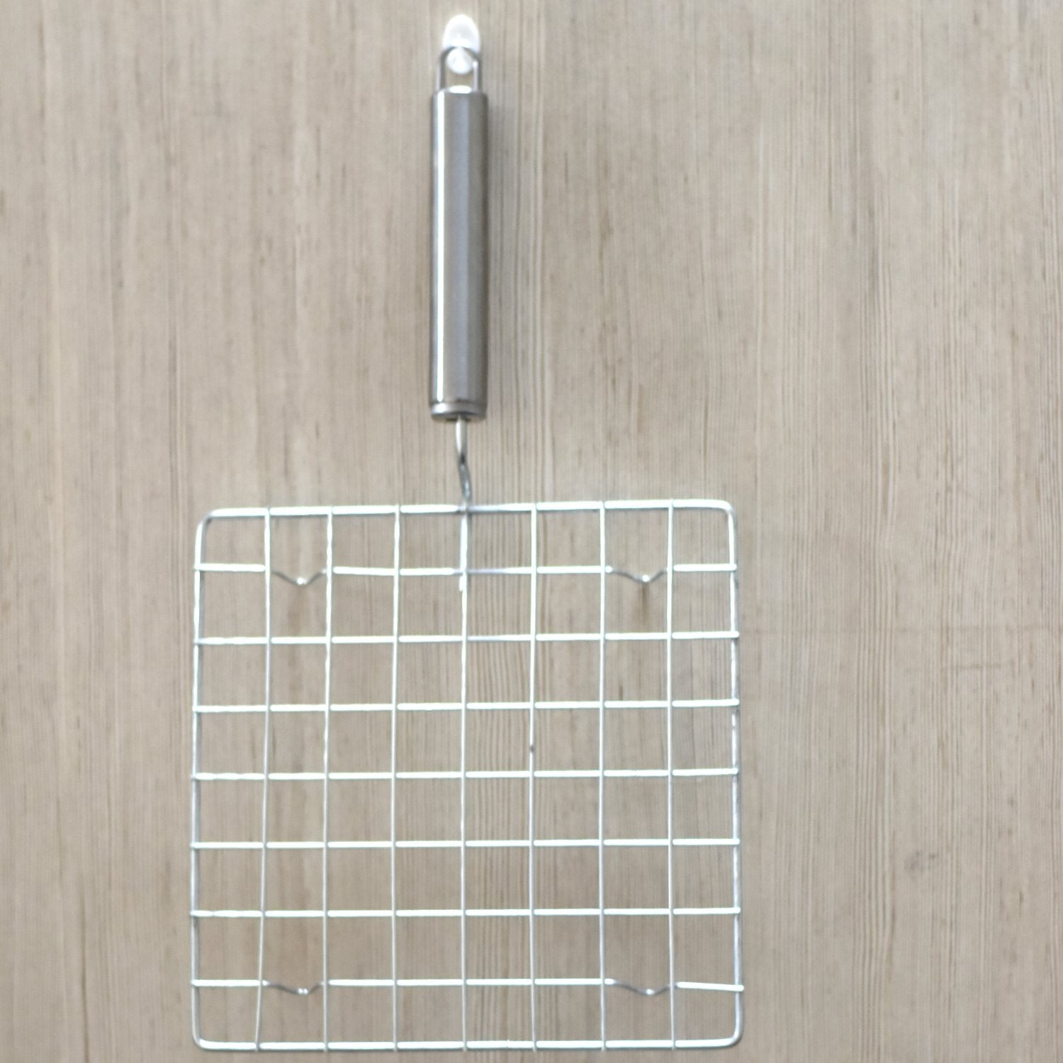 05_f2b13772-7294-48de-9f57-04d641ade8be.jpg Square Stainless Steel Barbecue Grill with Steel Handle - Front View by Nari Haat, Indian ethnic wear, women clothing...