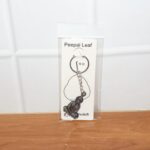 Premium Spiritual Hanuman Ji Sitting Pose Metal Keychain (1 Pc) - Fabric Detail by Nari Haat, Indian ethnic wear, wom...