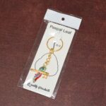 Krishna Flute with Peacock Feather Design Keychain (1 Pc) - Full Detail by Nari Haat, Indian ethnic wear, women cloth...