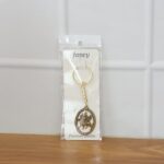 Premium Golden Metal Durga Maa Keychain (1 Pc) - Neckline Detail by Nari Haat, Indian ethnic wear, women clothing, de...