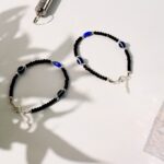 Adjustable Black Bead Evil Eye Protection Bracelet Set (2 Pc) - Back View by Nari Haat, Indian ethnic wear, women clo...
