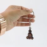 Lord Hanuman Sitting Pose Keychain (1 Pc) - Sleeve Design by Nari Haat, Indian ethnic wear, women clothing, designer ...