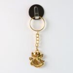 Golden Ganesh Leaf Design Keychain (1 Pc) - Back View by Nari Haat, Indian ethnic wear, women clothing, designer suit