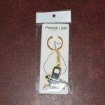 Shivling Design Golden Keychain (1 Pc) - Fabric Detail by Nari Haat, Indian ethnic wear, women clothing, designer suit