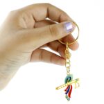 Krishna Flute with Peacock Feather Design Keychain (1 Pc) - Fabric Detail by Nari Haat, Indian ethnic wear, women clo...