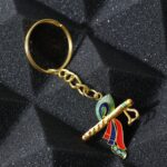 Krishna Flute with Peacock Feather Design Keychain (1 Pc) - Closeup Embroidery by Nari Haat, Indian ethnic wear, wome...